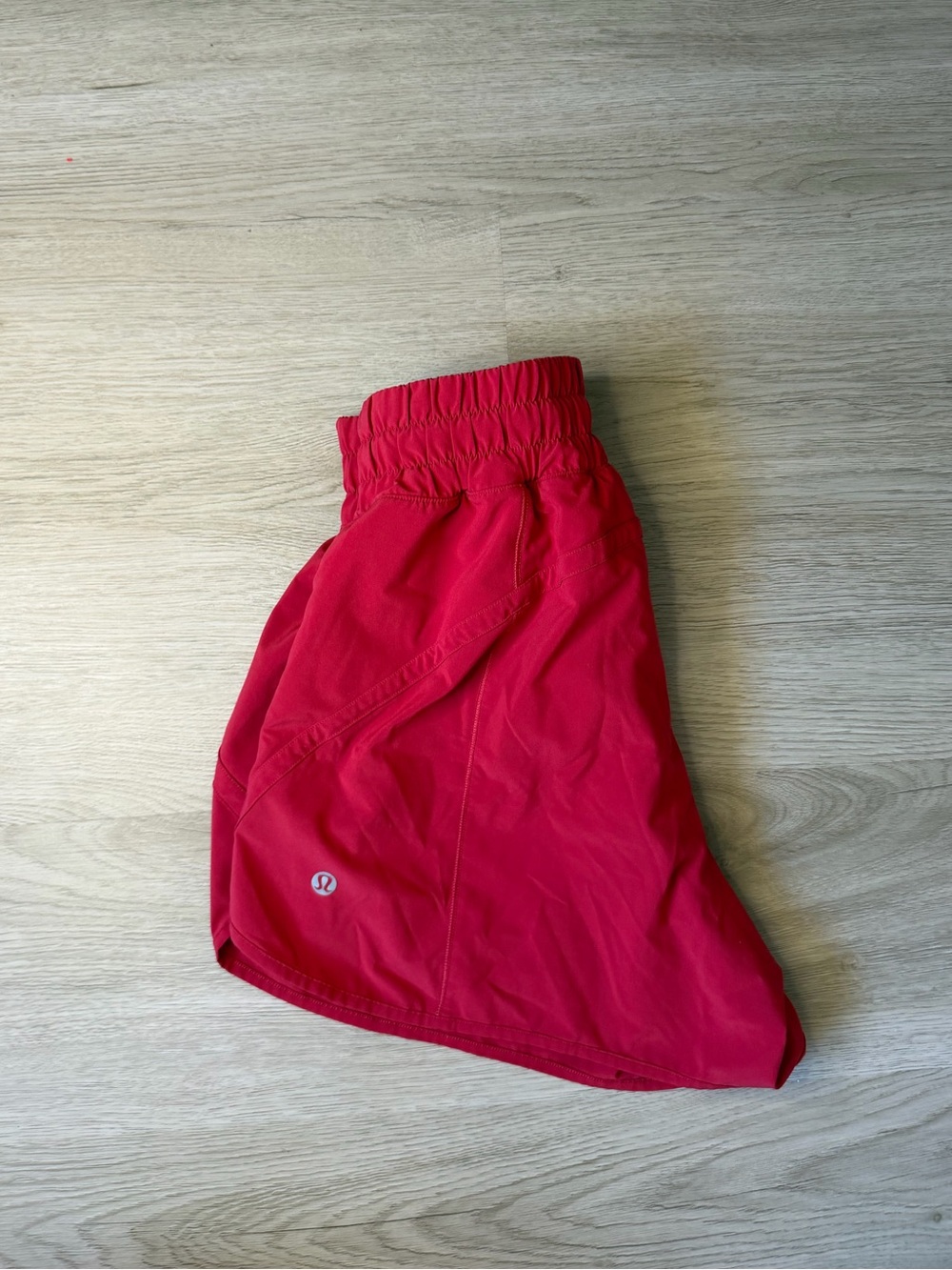 Bright red lululemon high rise track that shorts - Picture 2 of 4